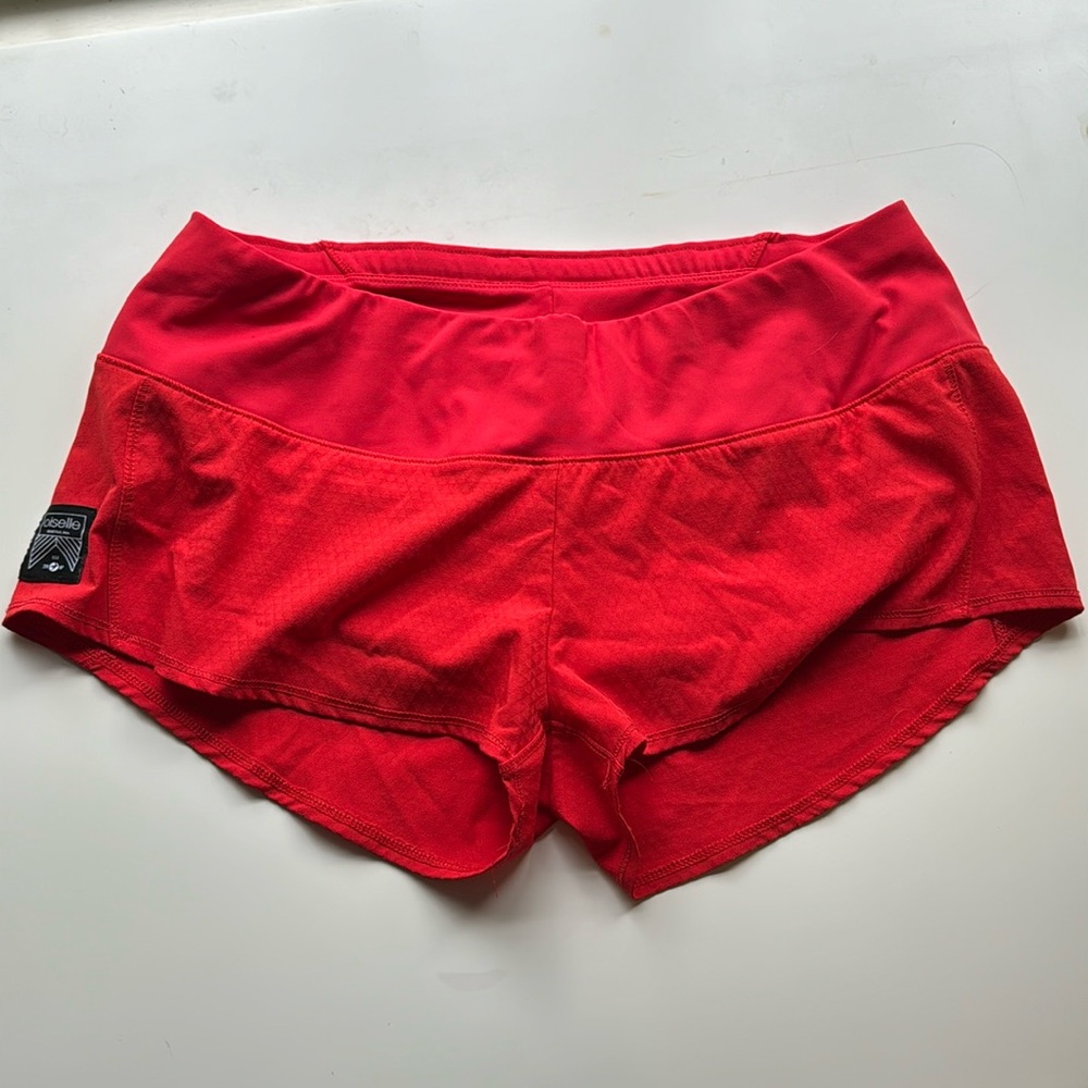 Size 06 oiselle work out shorts, red.